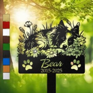 Personalized Australian Shepherd metal pet grave marker in a sleeping pose surrounded by daisy flowers, displayed in a sunlit garden with color swatch options