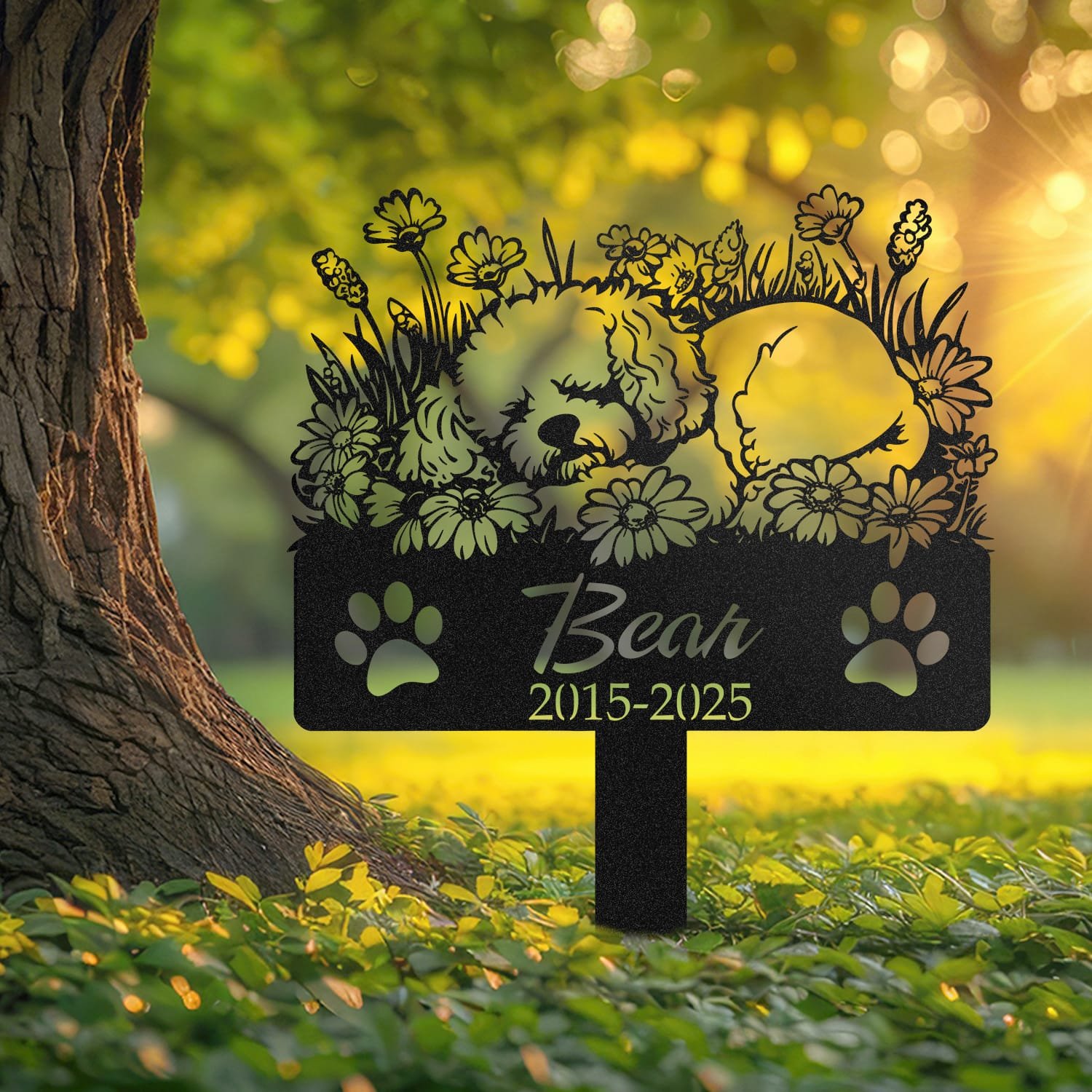 Bichon Frise pet grave marker placed in a rock garden bed in front of a brick house porch with an American flag
