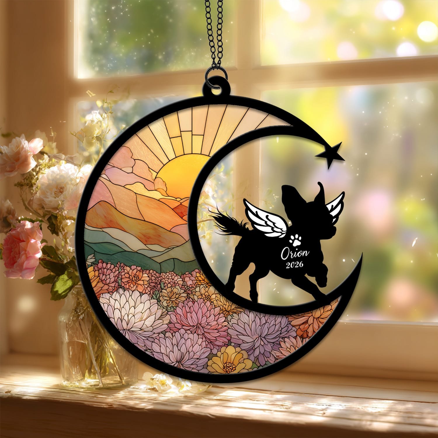 Standard style suncatcher showing a Chihuahua silhouette seated on the crescent moon beside a stained-glass floral field