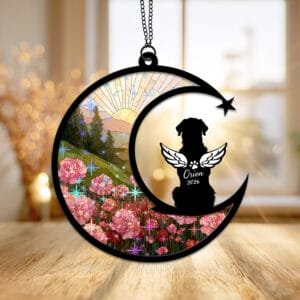 Crescent moon suncatcher with an angel-winged Golden Retriever silhouette over a stained-glass rose garden