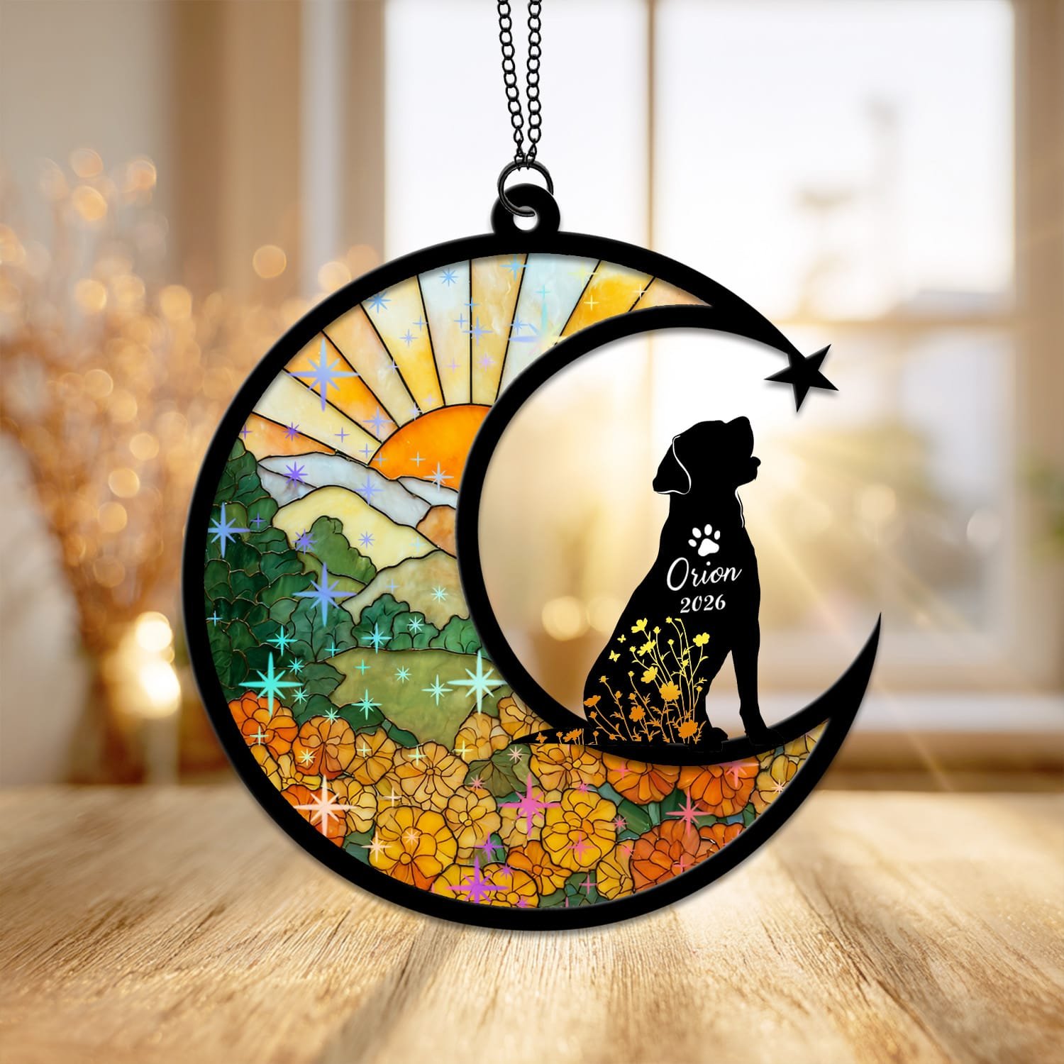 Crescent moon suncatcher with a floral-filled Labrador silhouette beside a shooting star over a stained-glass marigold field