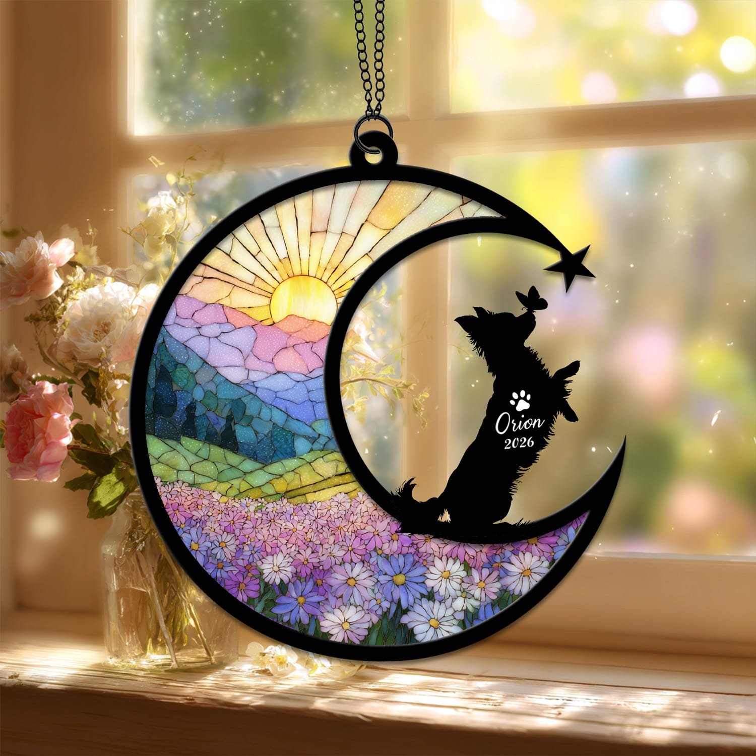Standard style suncatcher showing a Long-Haired Chihuahua silhouette seated on the crescent moon beside a stained-glass floral field
