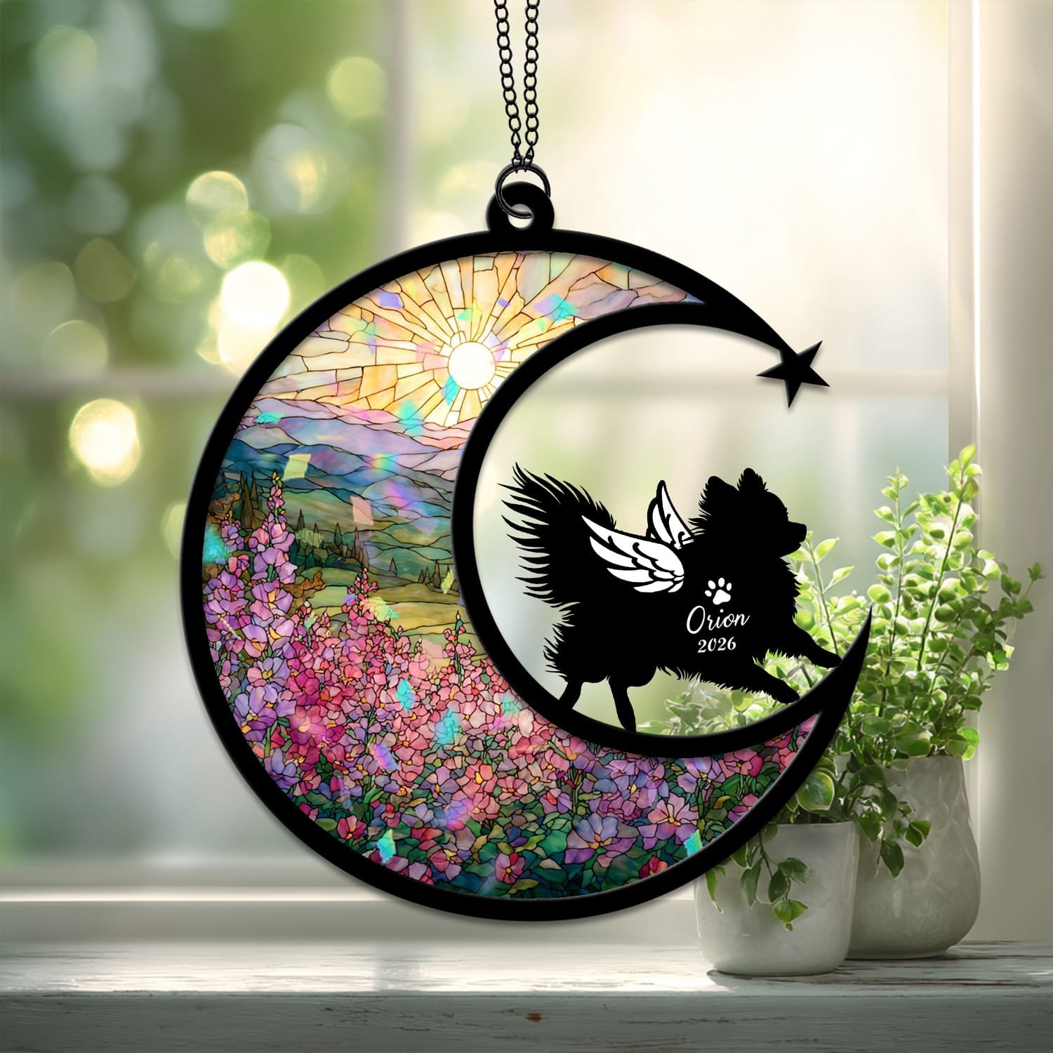 Broken Glass style suncatcher showing a Pomeranian silhouette against a cracked-glass style floral crescent moon background