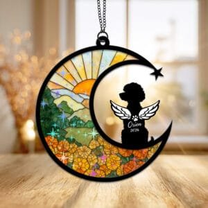 Crescent moon suncatcher with a curly-coated Poodle silhouette over a stained-glass marigold field