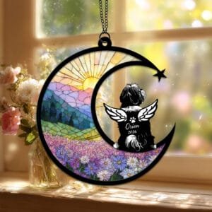 Crescent moon suncatcher with an angel-winged Shih Tzu silhouette over a stained-glass lavender and daisy field
