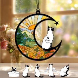 Crescent moon suncatcher with a color-point Siamese Cat silhouette over a stained-glass marigold field