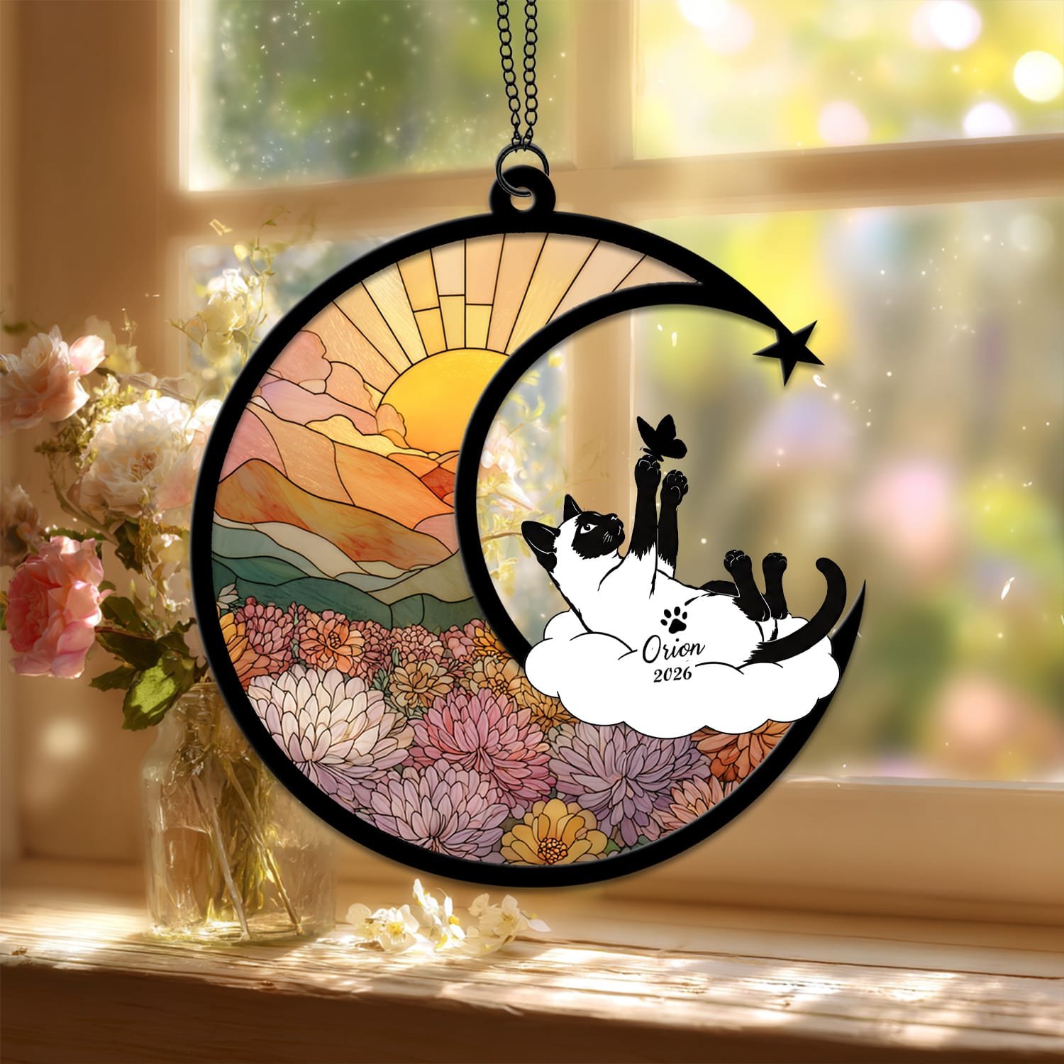 Standard style suncatcher showing a Siamese Cat silhouette seated on the crescent moon beside a stained-glass floral field