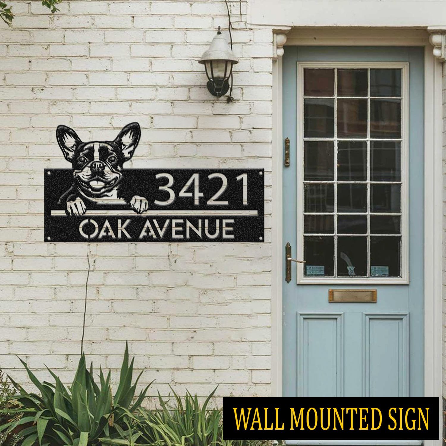 Boston Terrier address sign attached flush to a brick wall