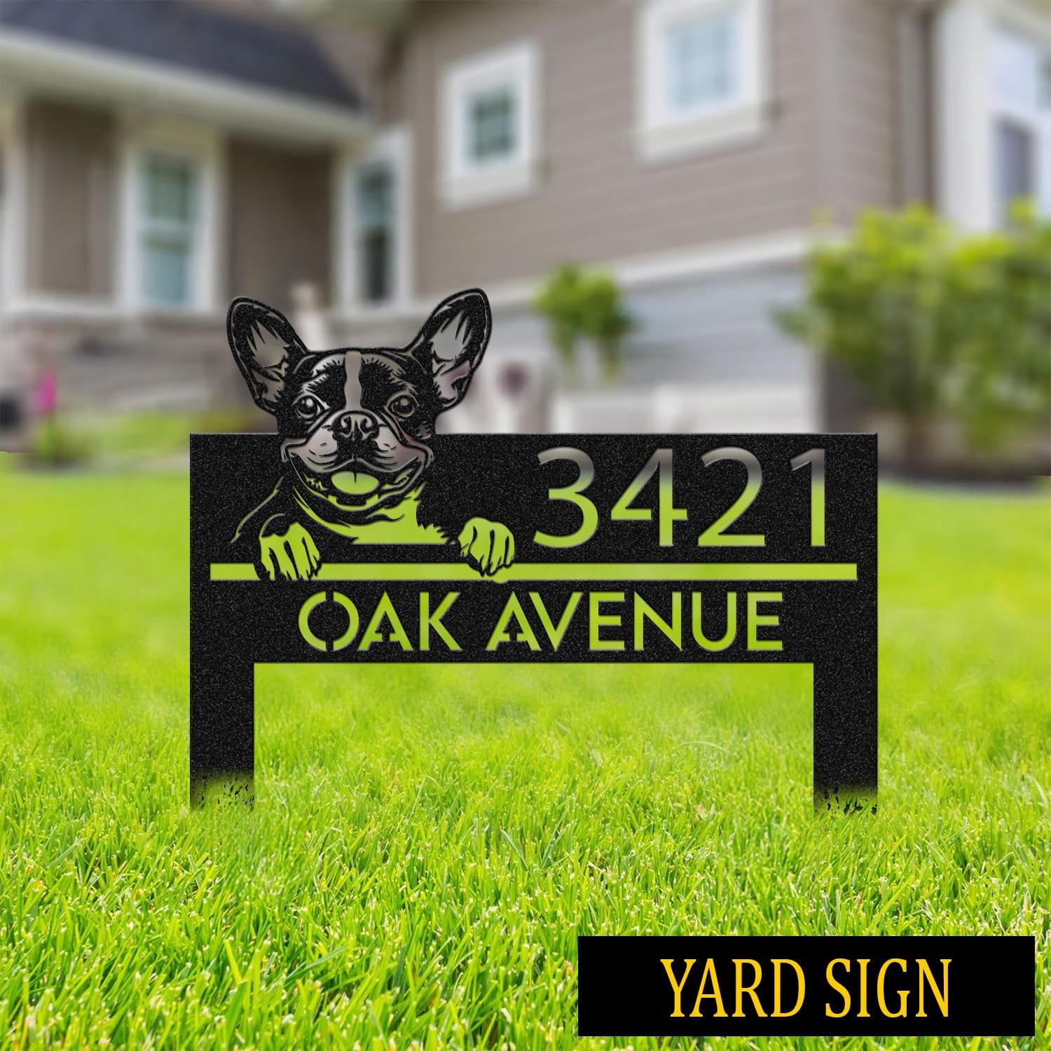 Boston Terrier address sign on stakes in a grassy front yard with a house in the background