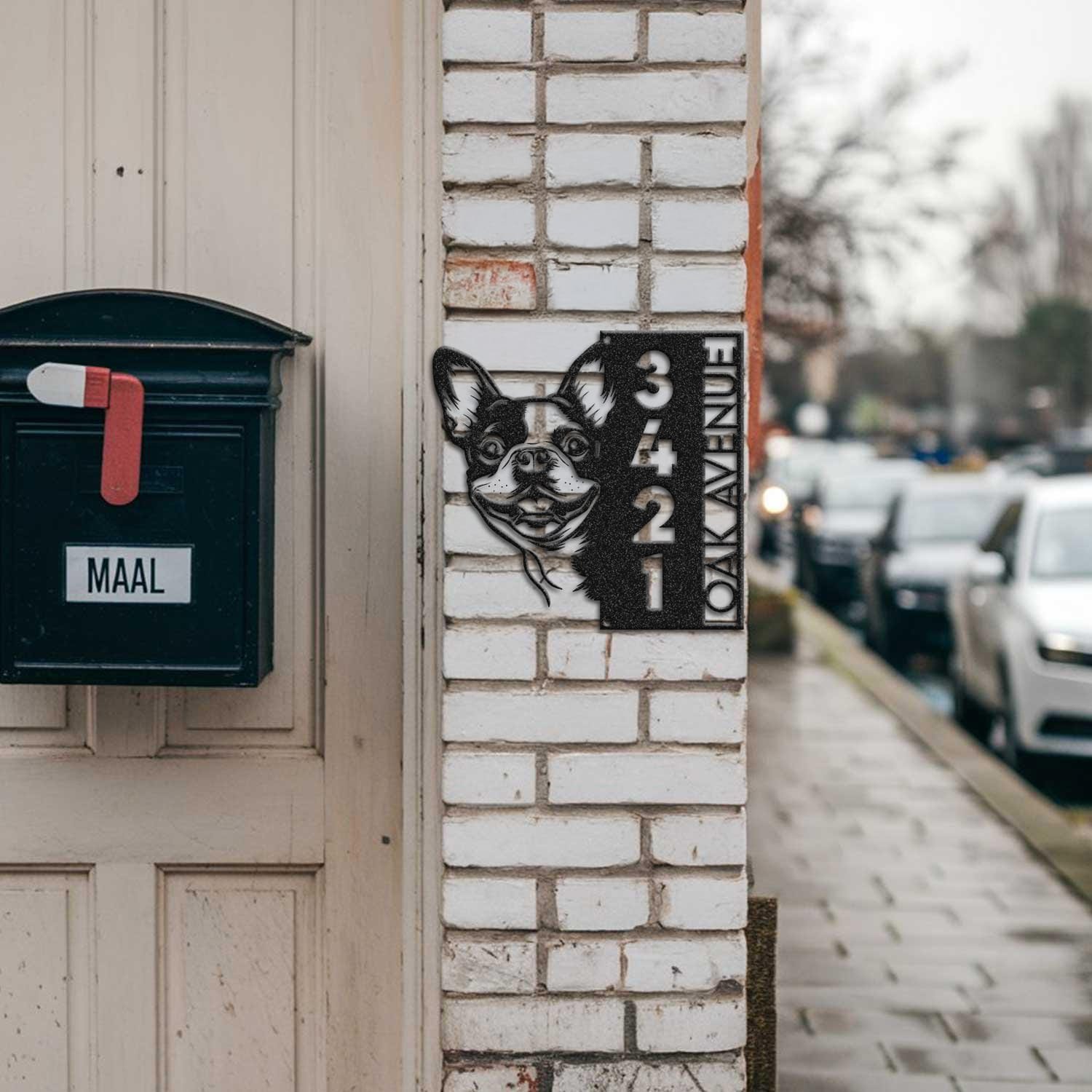 Boston Terrier bandana address sign mounted on a brick pillar near a mailbox and front door