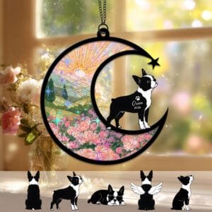 Crescent moon suncatcher with a standing Boston Terrier silhouette gazing at a shooting star over a stained-glass pink rose garden
