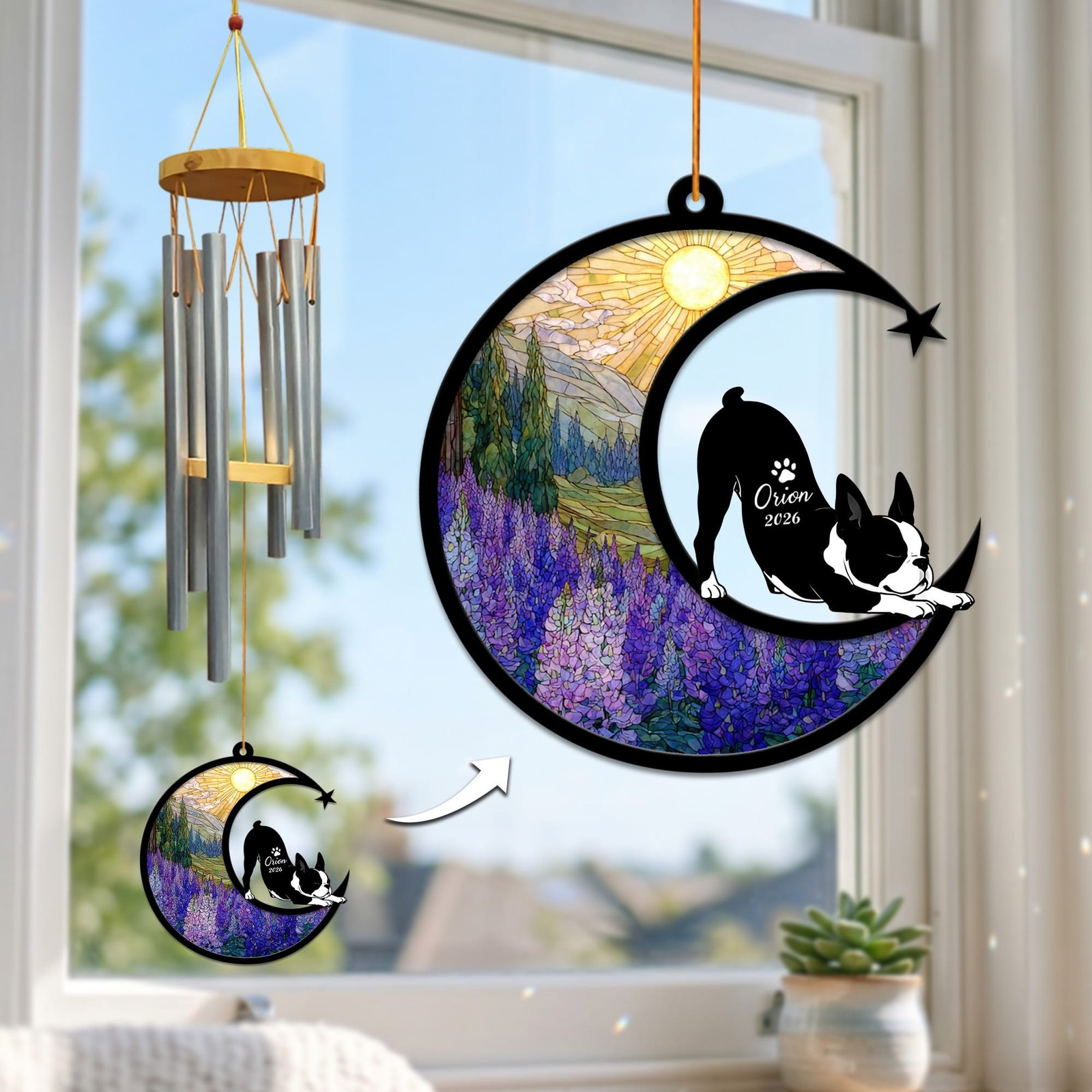 Stained-glass memorial wind chime suncatcher showing a Boston Terrier stretching in a play bow on a crescent moon above a purple lupine field, hanging in a sunny window