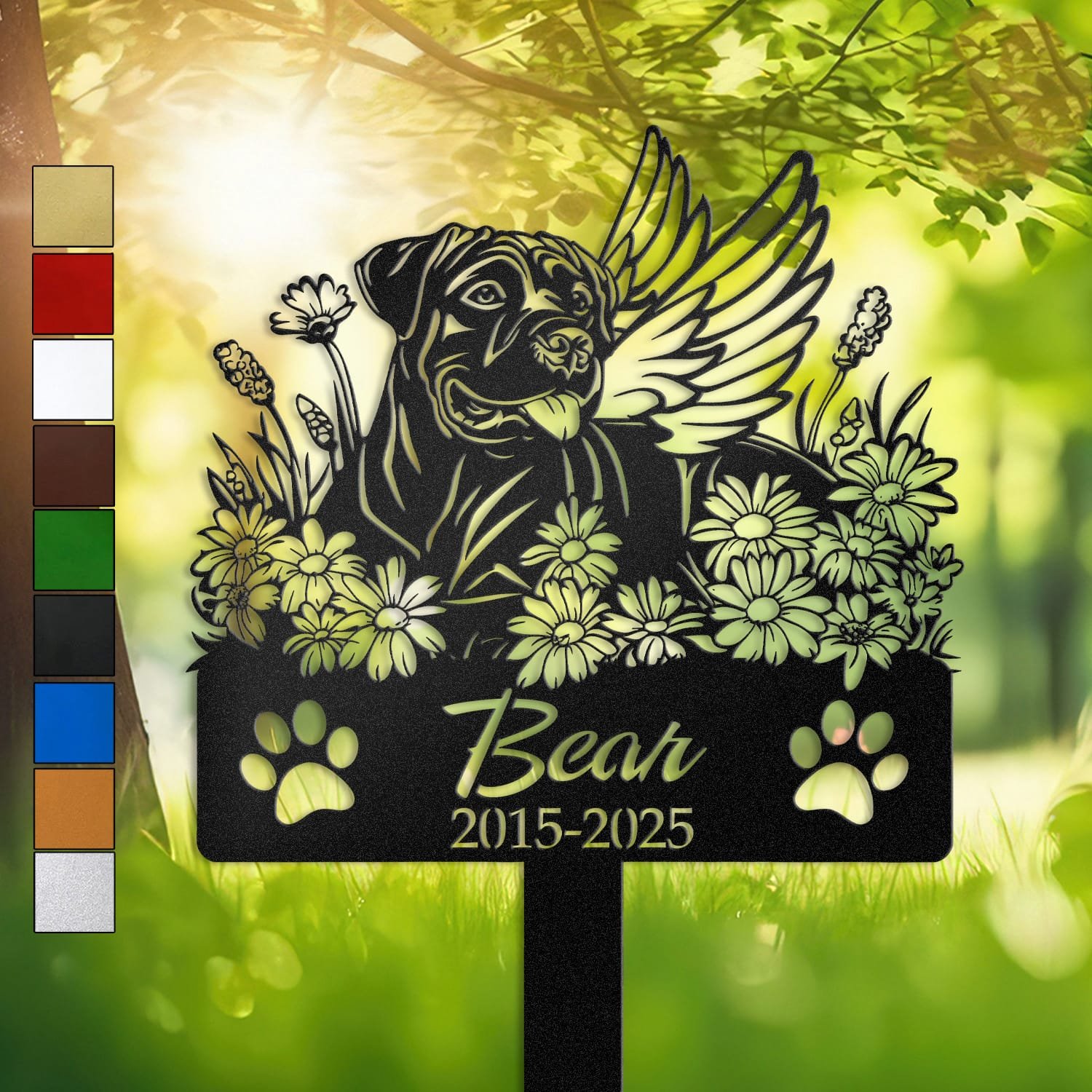 Personalized Cane Corso metal pet grave marker with angel wings and daisy flowers, displayed in a sunlit garden with color swatch options