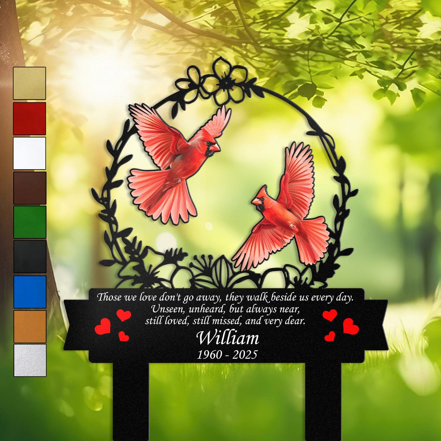 Pair of red cardinals inside a floral wreath on a personalized metal garden stake, engraved with a memorial verse and name plate.