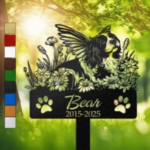 Cavalier King Charles Spaniel silhouette with angel wings surrounded by a daisy floral border on a personalized metal garden stake, with paw print cutouts at the base.