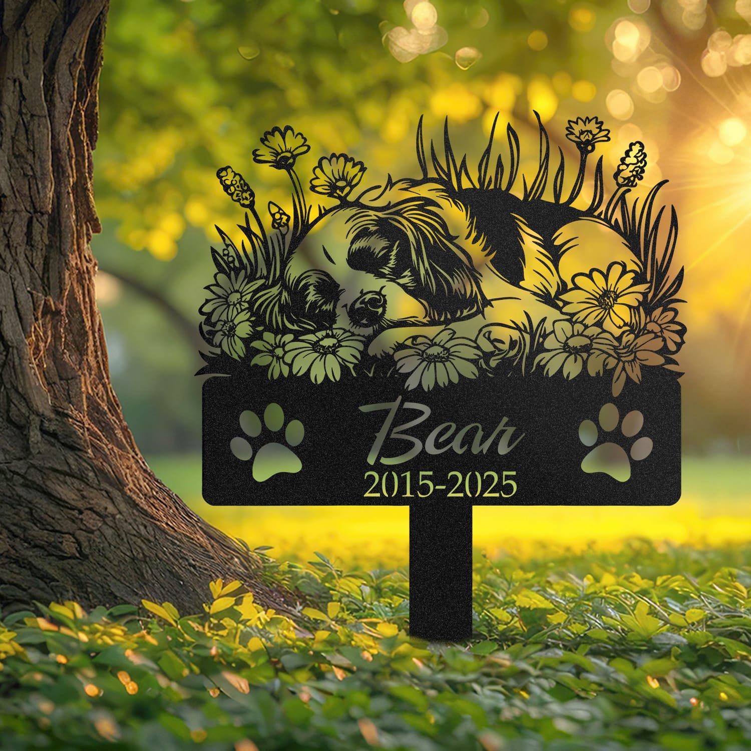 Cavalier King Charles Spaniel pet grave marker displayed outdoors in a garden setting, showing the personalized sleeping-pose daisy floral design in place on the stake.