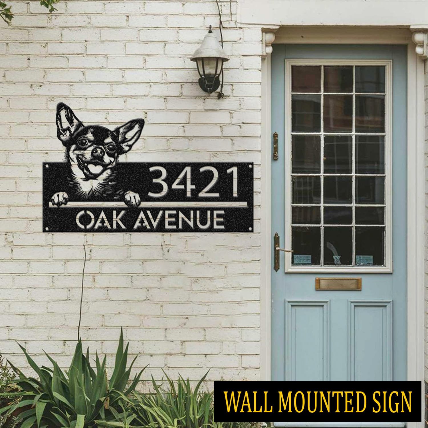 Chihuahua address sign attached flush to a brick wall