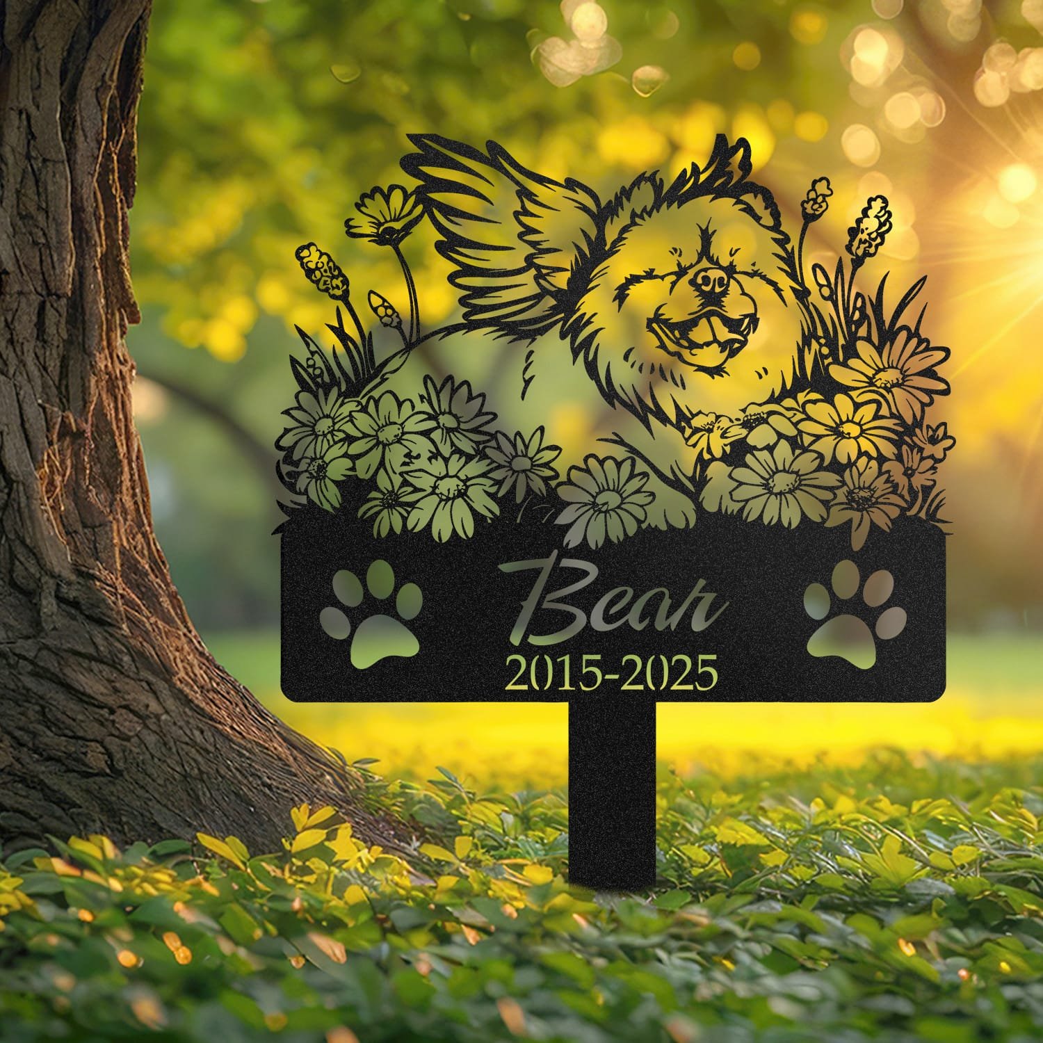 Chow Chow angel wings pet grave marker shown close up in a sunlit garden with daisy flowers and grass