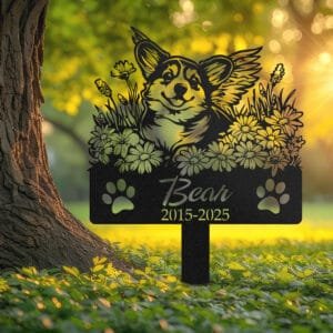 Corgi silhouette with angel wings surrounded by a daisy floral border on a personalized metal garden stake, with paw print cutouts at the base.