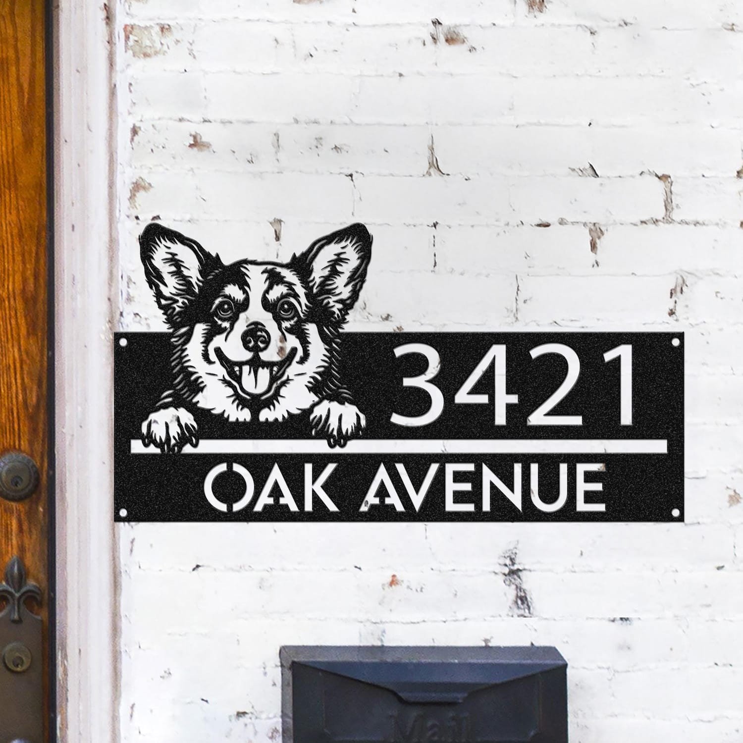 Corgi peeking over a compact horizontal address sign reading 3421 Oak Avenue
