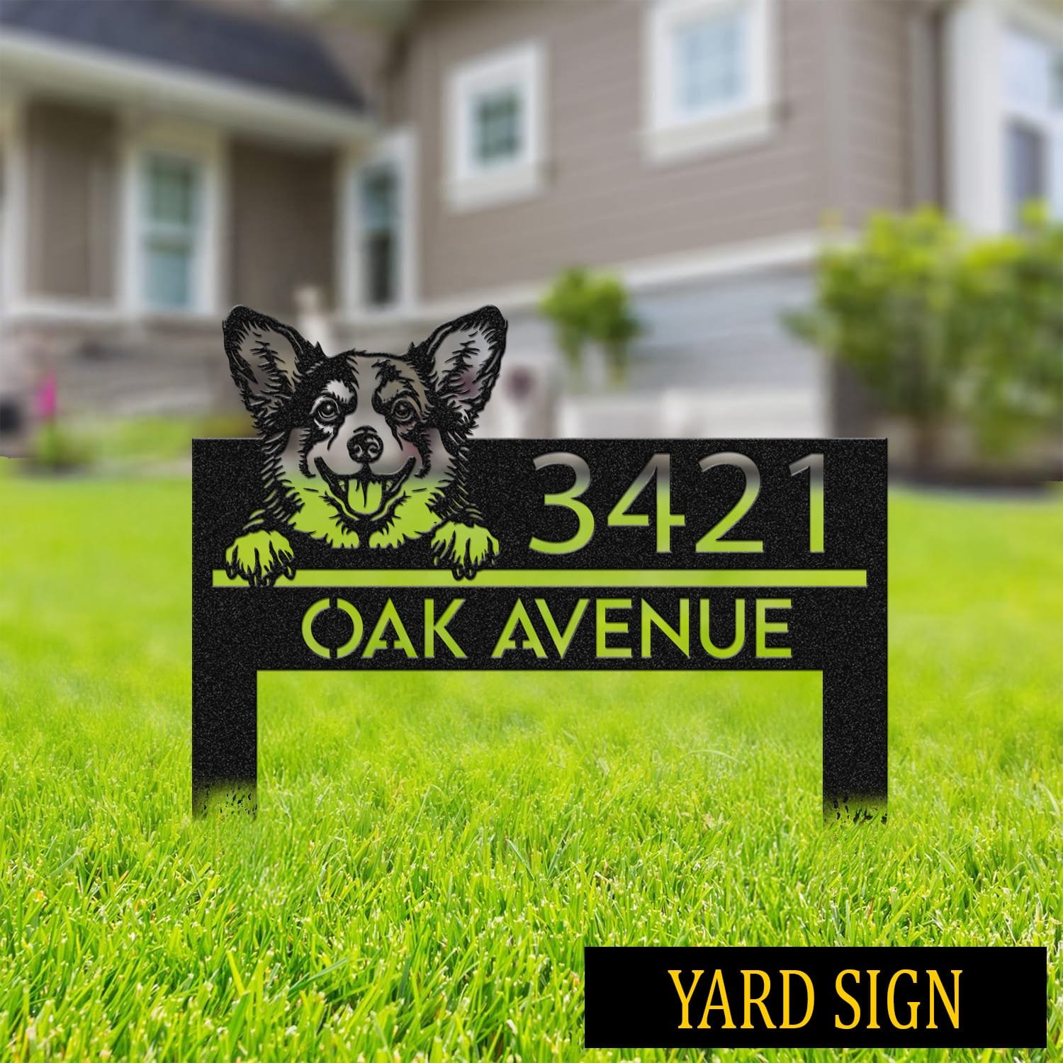 Corgi address sign on stakes in a grassy front yard with a house in the background