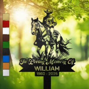 Metal memorial design of a cowboy riding a horse, viewed from the front, set within a circular medallion frame and engraved with 'In Loving Memory Of', personalized with a name and memorial years.