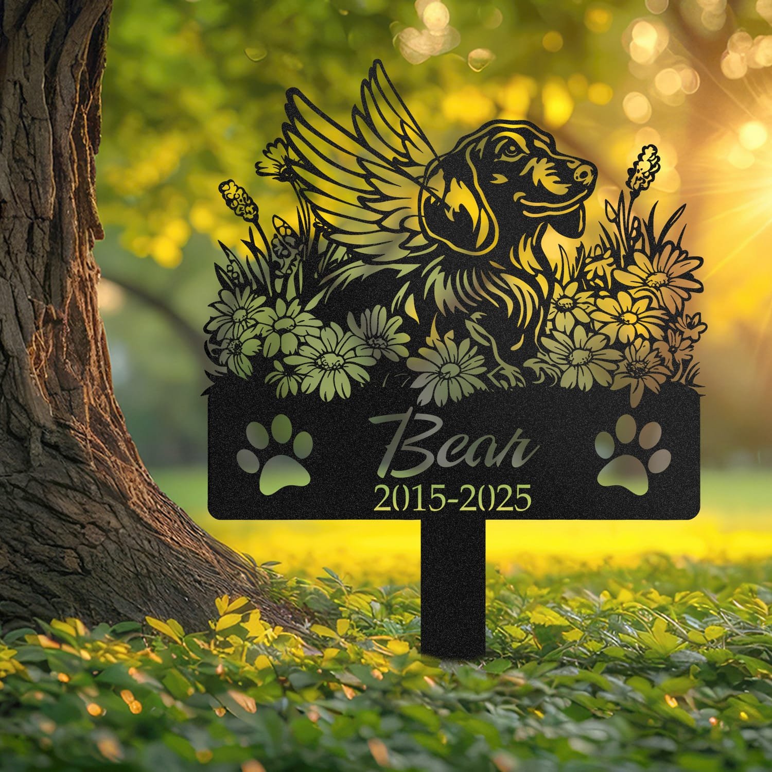 Dachshund pet grave marker displayed outdoors in a garden setting, showing the personalized angel wings and daisy floral design in place on the stake.