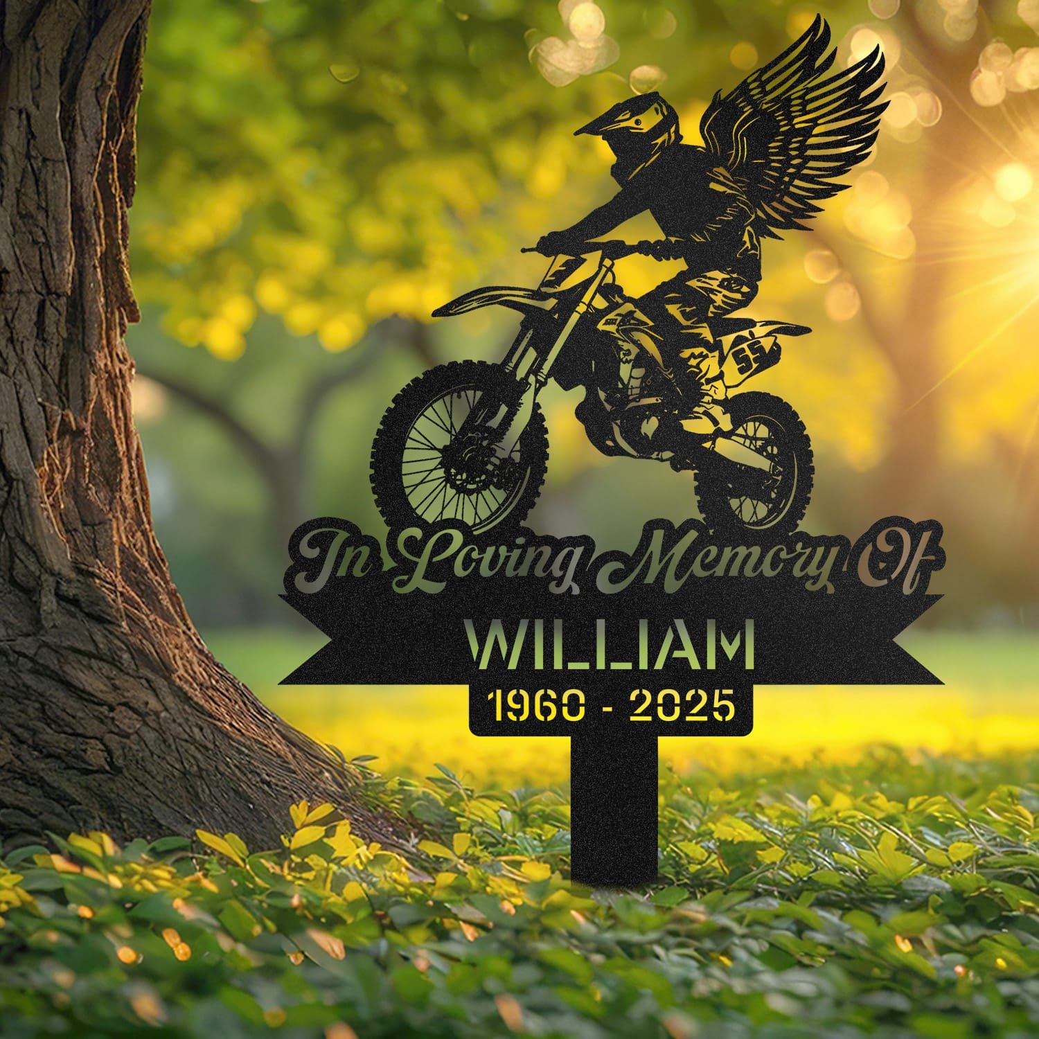Dirt Bike human grave marker displayed outdoors in a garden setting, showing the personalized dirt bike winged rider design in place on the stake.