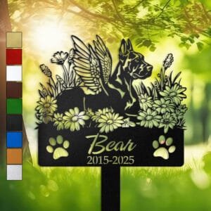 Personalized Doberman metal pet grave marker with angel wings and daisy flowers, displayed in a sunlit garden with color swatch options