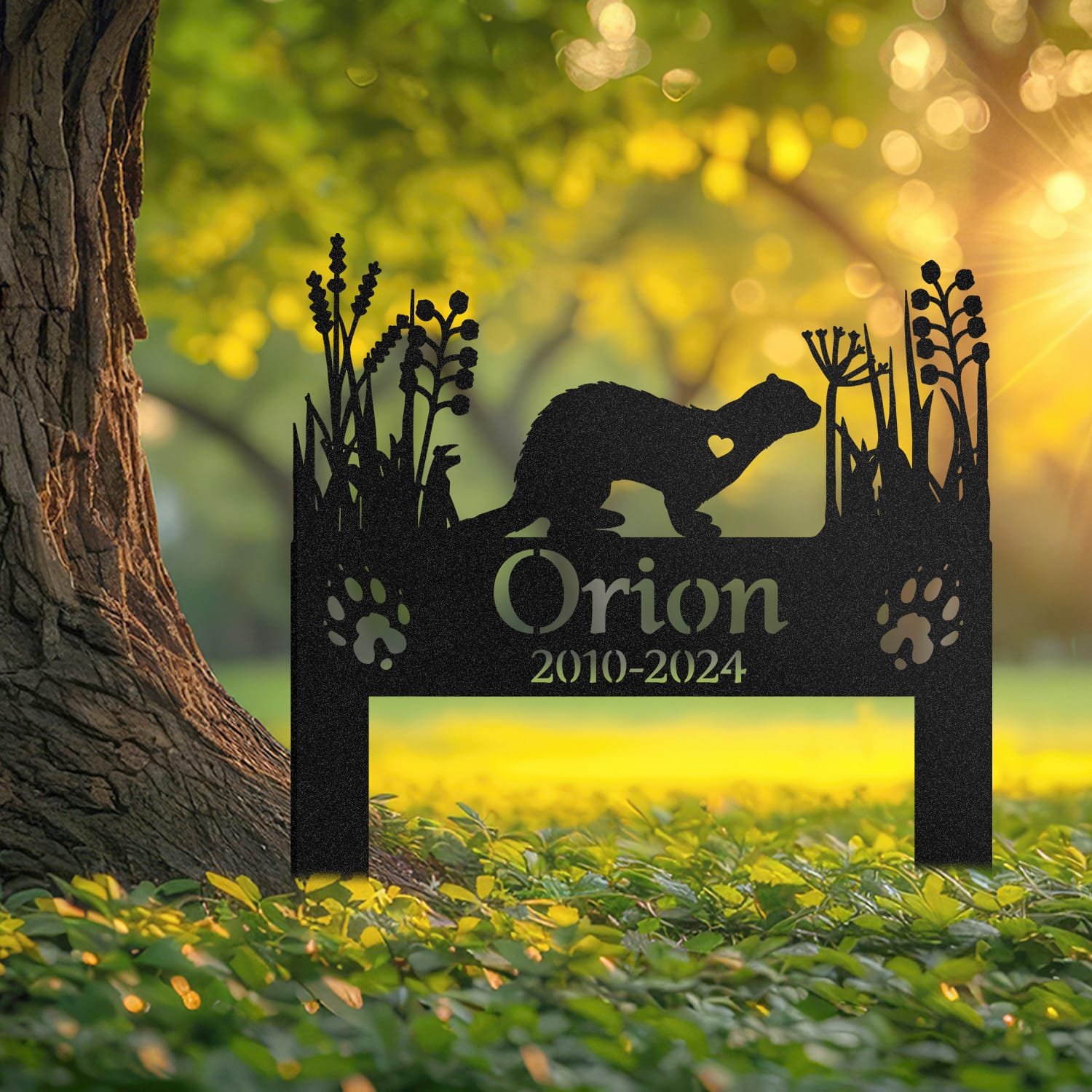 Ferret pet grave marker displayed outdoors in a garden setting, showing the personalized heart-cutout silhouette design in place on the stake.