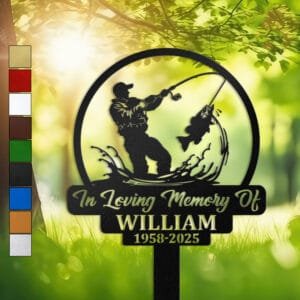 Metal memorial design of a fisherman reeling in a leaping fish amid splashing water, set within a circular medallion frame and engraved with 'In Loving Memory Of', personalized with a name and memorial years.