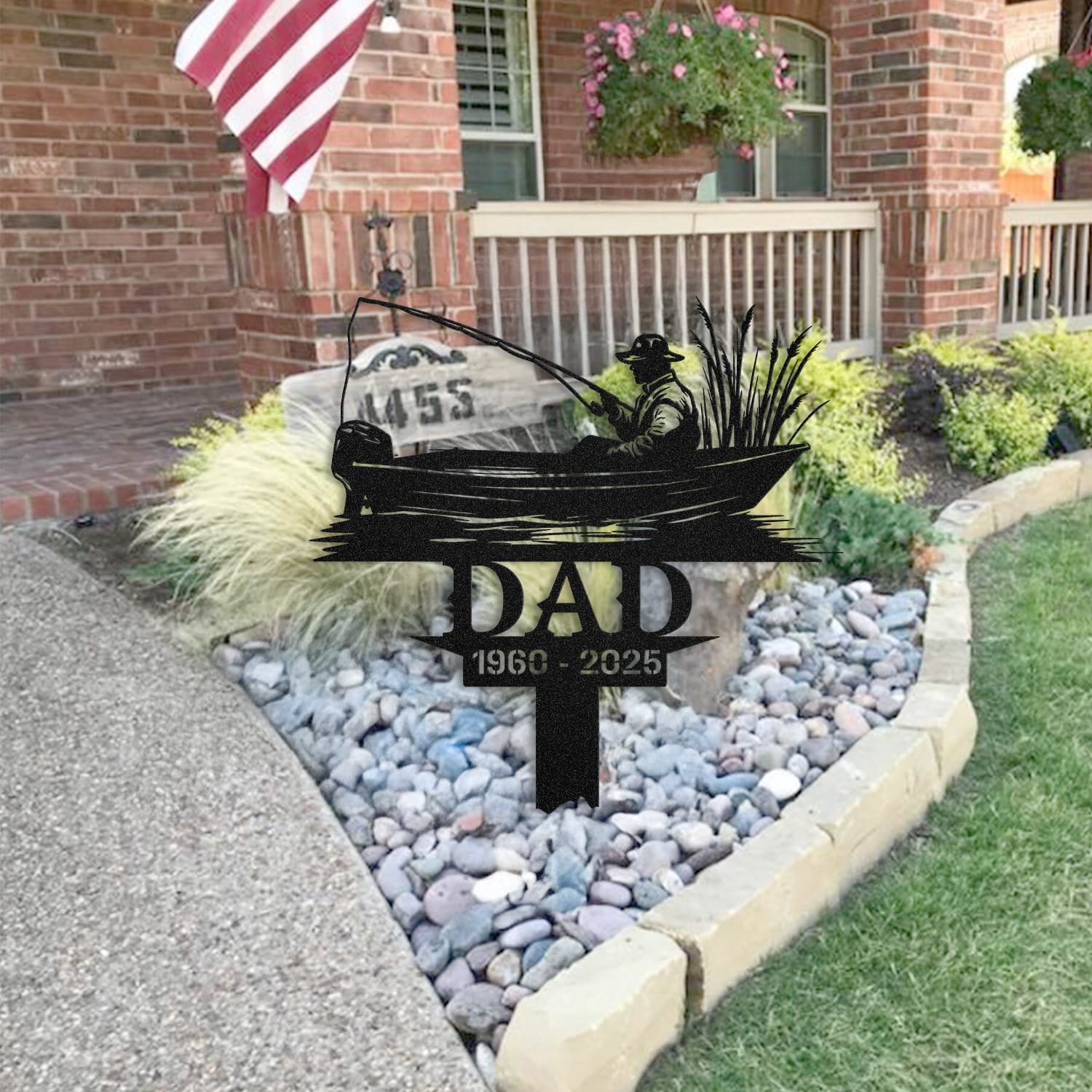 Fisherman human grave marker staged near a home entryway, showing the finished design and personalization outdoors.