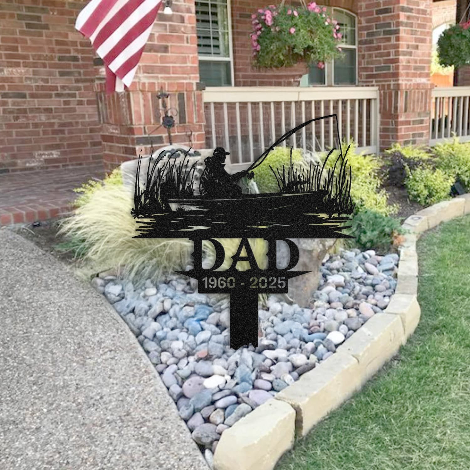 Fisherman human grave marker staged near a home entryway, showing the finished design and personalization outdoors.