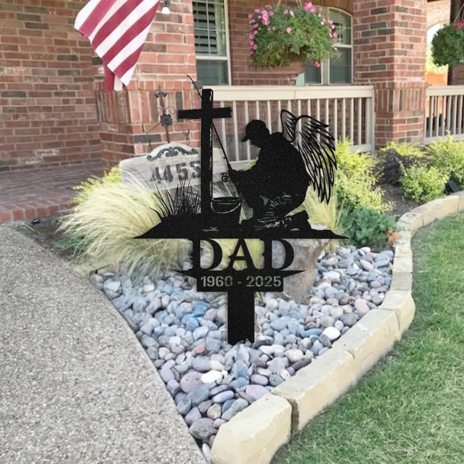 Fisherman human grave marker staged near a home entryway, showing the finished design and personalization outdoors.