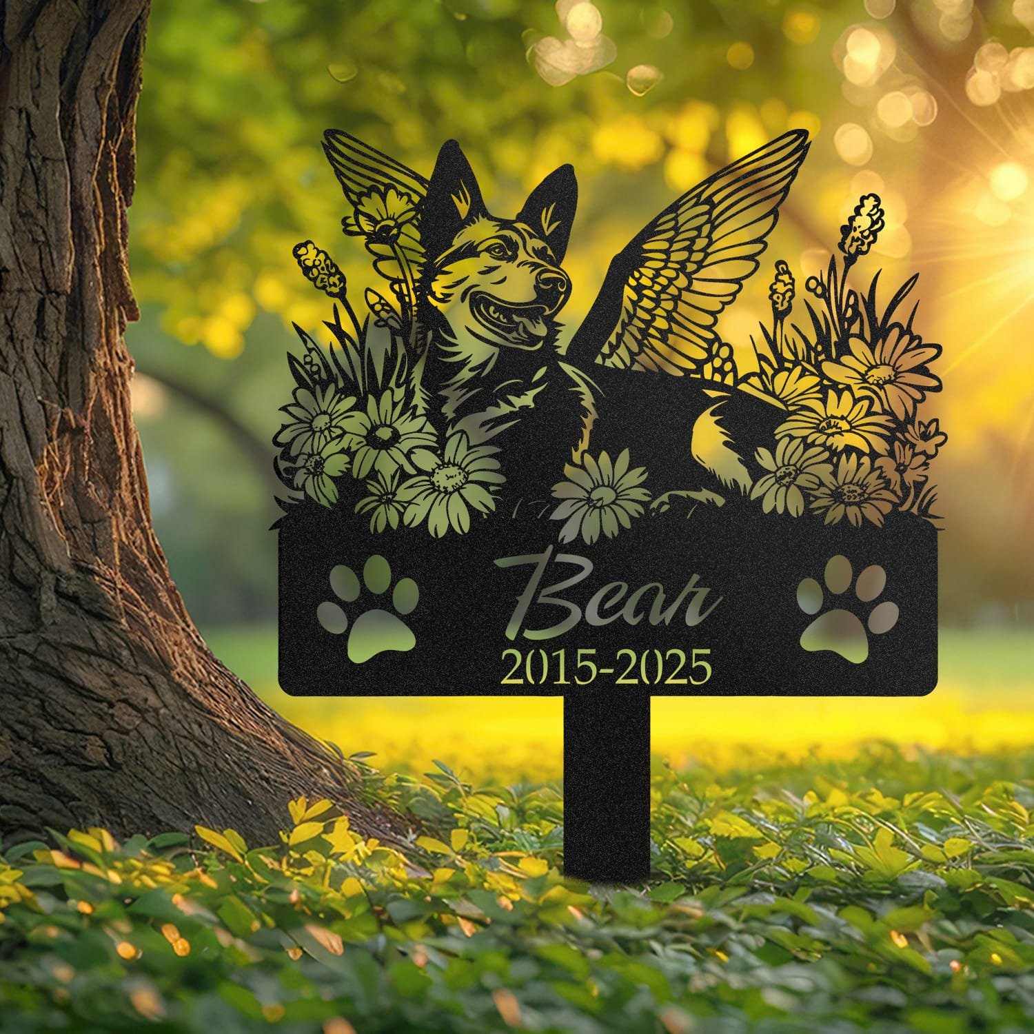 German Shepherd pet grave marker displayed outdoors in a garden setting, showing the personalized angel wings and daisy floral design in place on the stake.