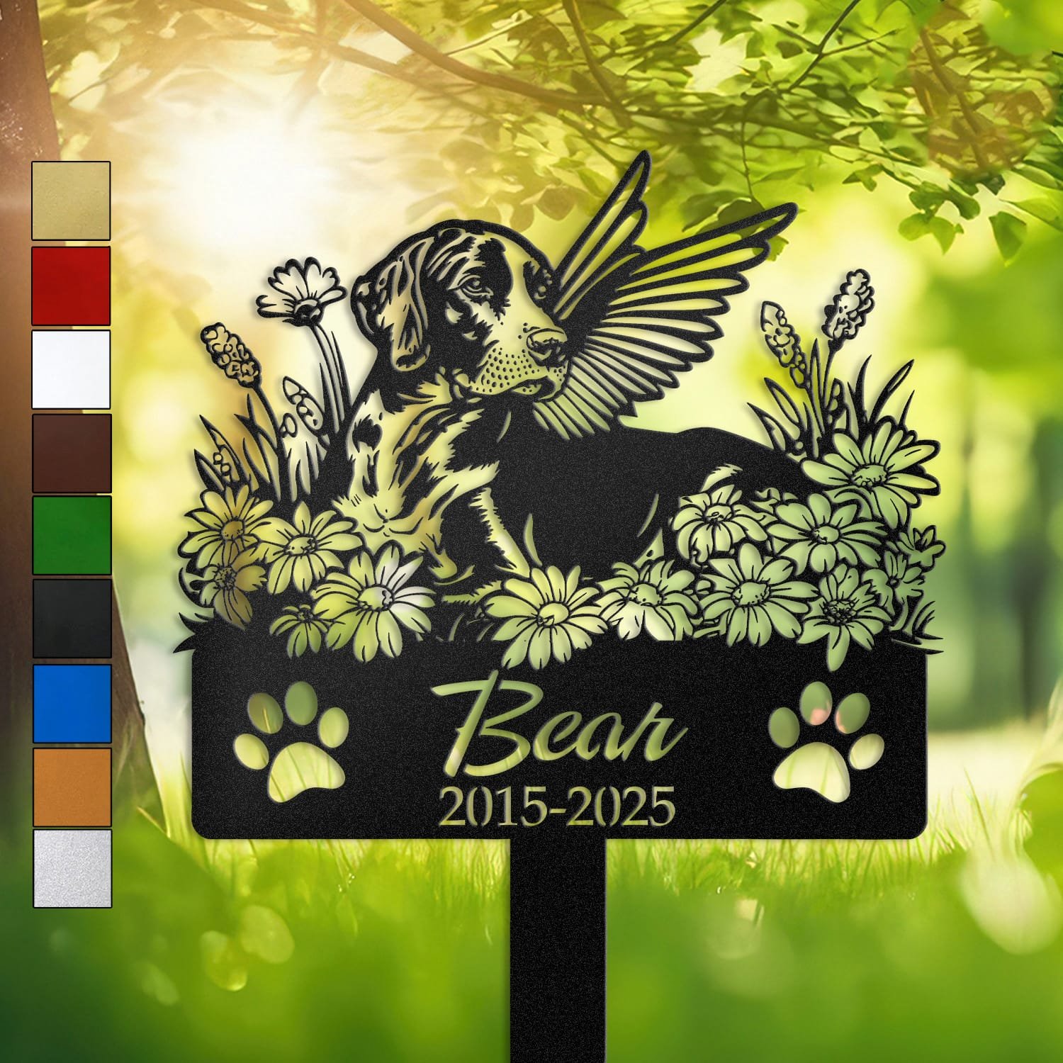 Personalized German Shorthaired Pointer metal pet grave marker with angel wings and daisy flowers, displayed in a sunlit garden with color swatch options