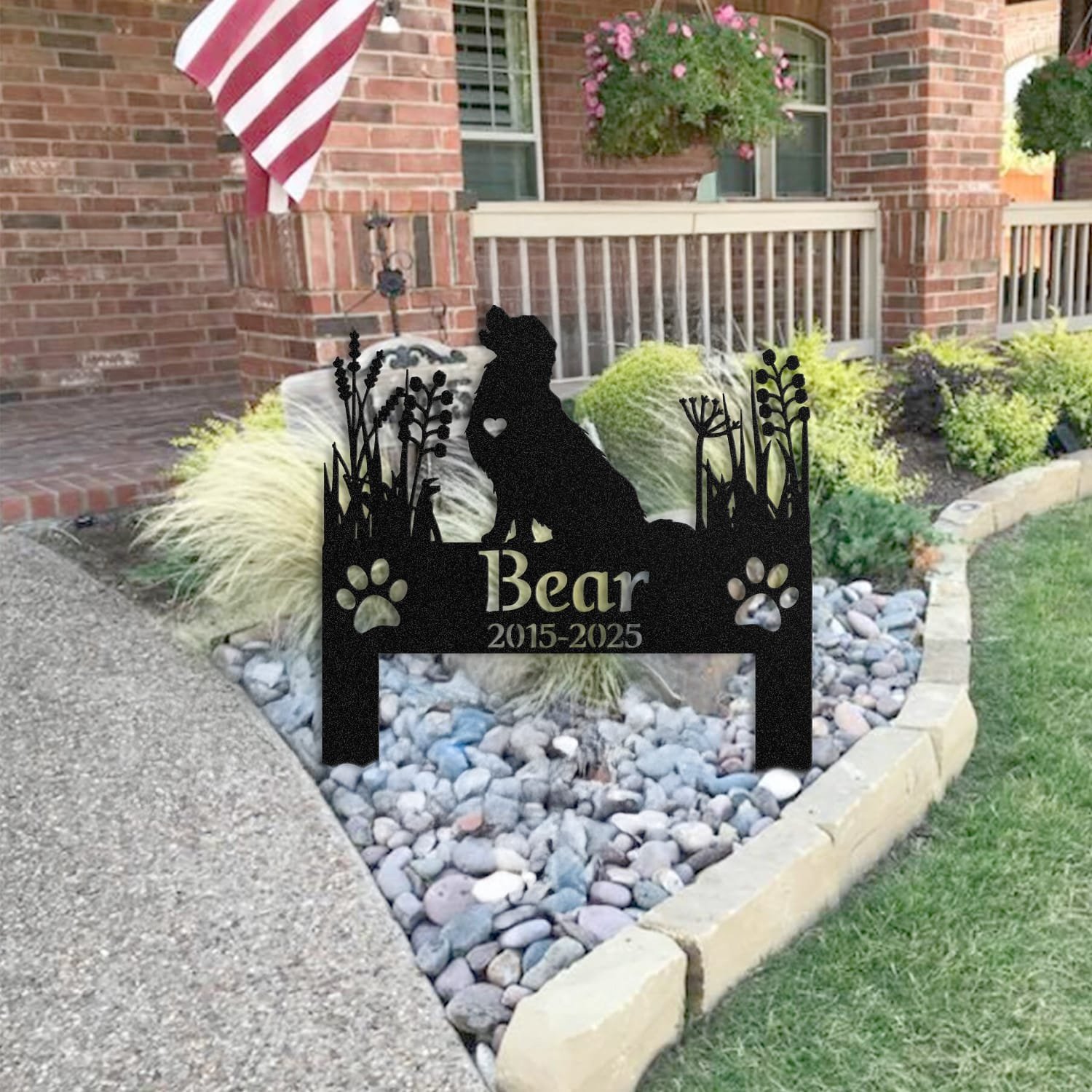 Golden Retriever pet grave marker staged near a home entryway, showing the finished heart-cutout silhouette design and name plate outdoors.