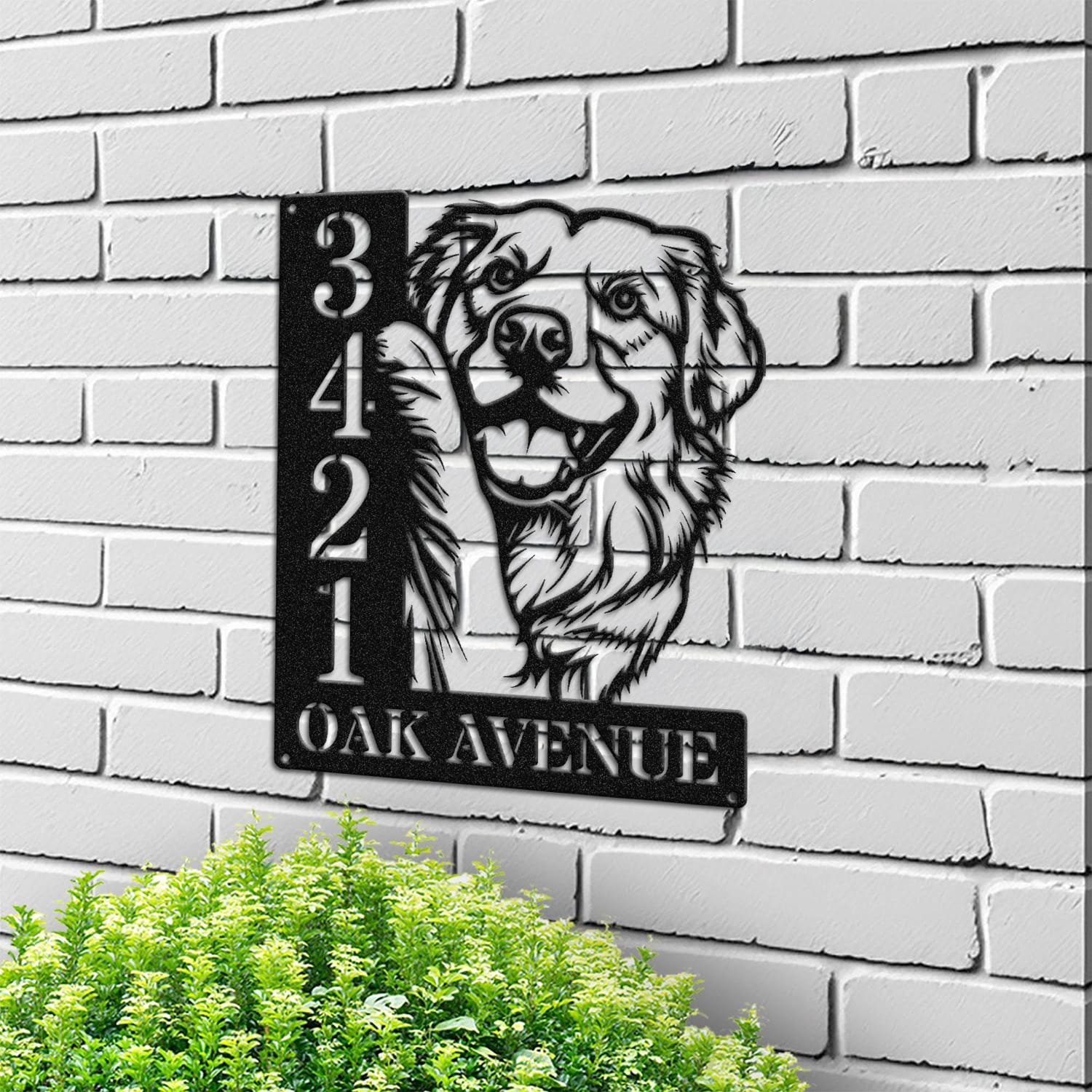 Golden Retriever address sign mounted on a light brick wall in a street-facing view