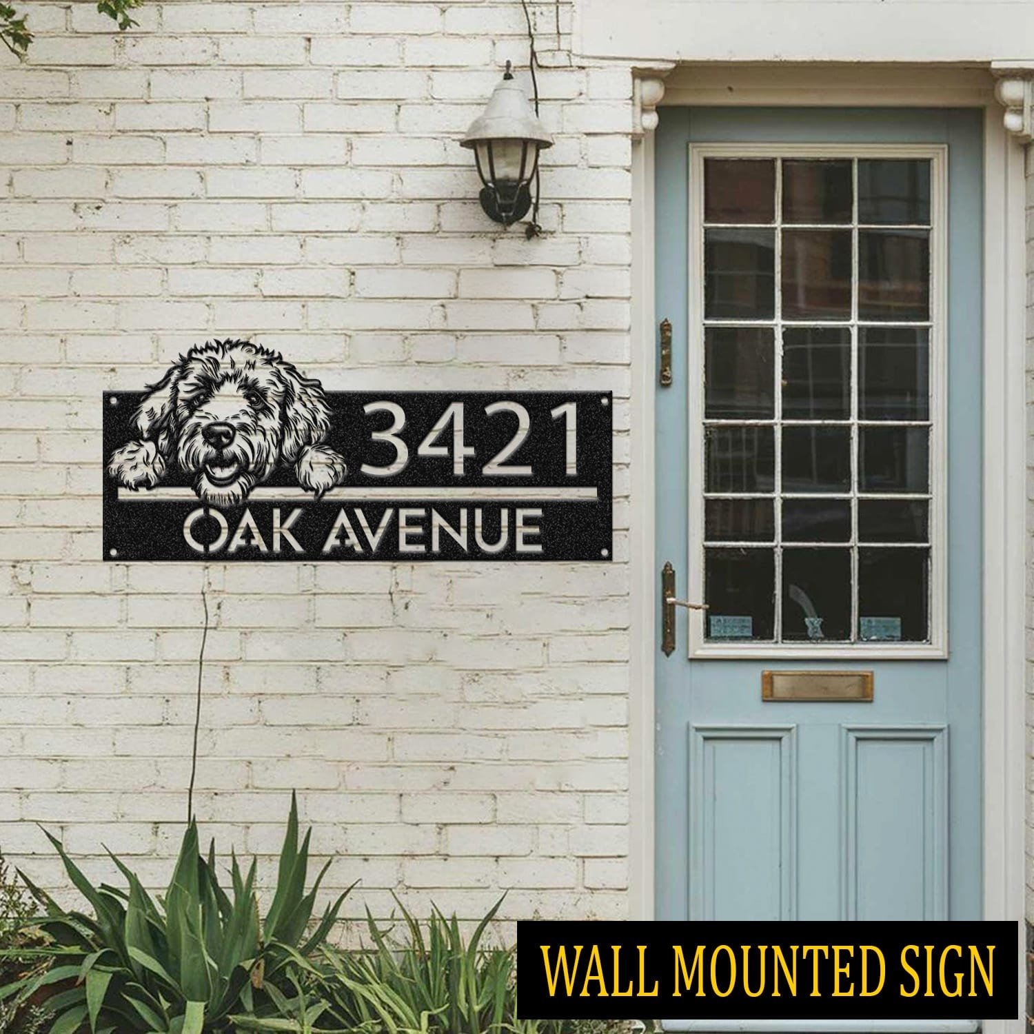 Goldendoodle address sign attached flush to a brick wall