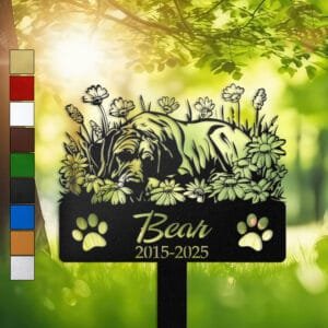 Personalized Great Dane metal pet grave marker in a curled sleeping pose surrounded by daisy flowers, displayed in a sunlit garden with color swatch options