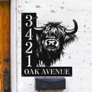 Personalized Highland Cow address sign with a front-facing shaggy Highland Cow head peeking over a vertical house number plaque reading 3421 Oak Avenue