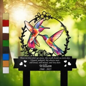 Pair of colorful hummingbirds inside a floral wreath on a personalized metal garden stake, engraved with a memorial verse and name plate.