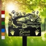Iguana resting in a peaceful sleeping pose within a daisy floral border on a personalized metal garden stake, with clawed reptile print cutouts at the base.