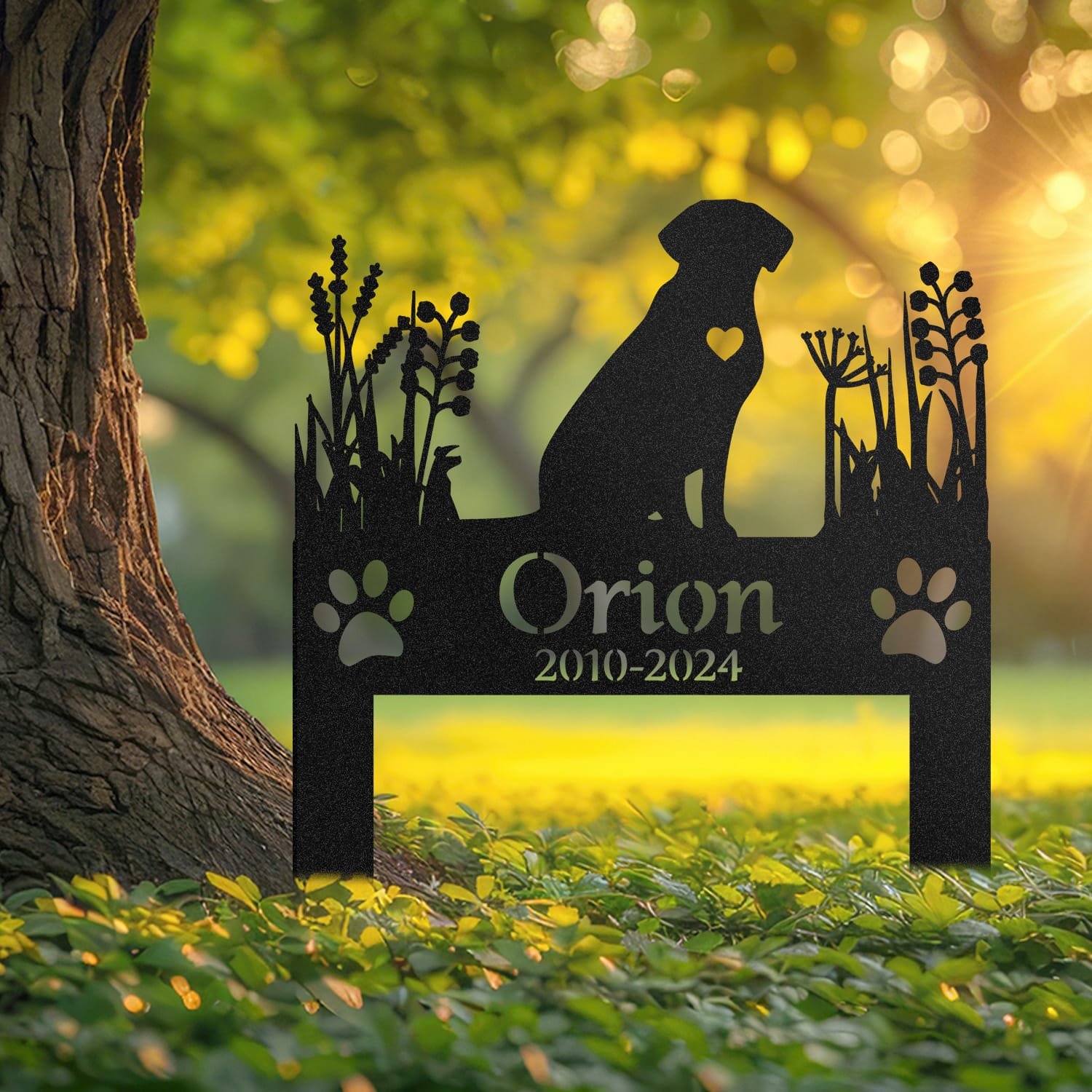 Labrador pet grave marker displayed outdoors in a garden setting, showing the personalized heart-cutout silhouette design in place on the stake.