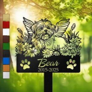 Maltese silhouette with angel wings surrounded by a daisy floral border on a personalized metal garden stake, with paw print cutouts at the base.