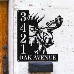 Personalized moose address sign with a moose head and broad antlers peeking over a vertical house number plaque reading 3421 Oak Avenue
