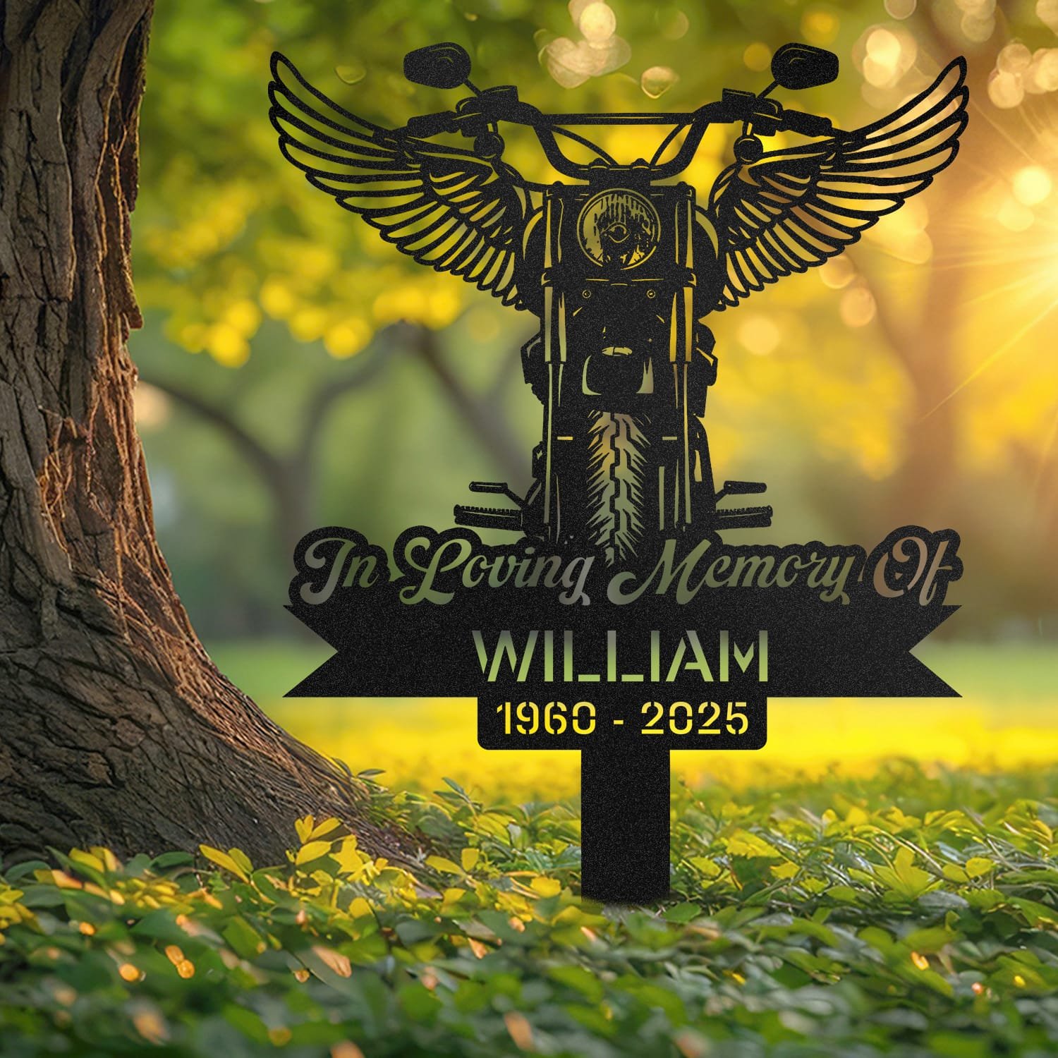 Motorcycle human grave marker displayed outdoors in a garden setting, showing the personalized motorcycle angel wings design in place on the stake.