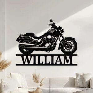Classic cruiser motorcycle silhouette with a custom name cut into the base of a personalized metal wall sign.