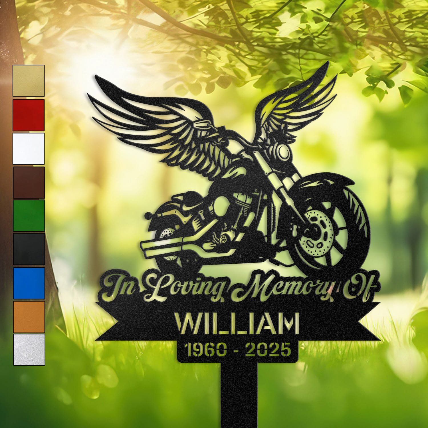 Motorcycle human grave marker displayed outdoors in a garden setting, showing the personalized motorcycle winged rider design in place on the stake.