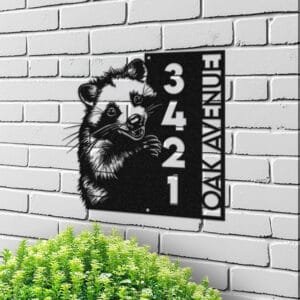Personalized opossum address sign with an opossum peeking over a vertical house number plaque reading 3421 Oak Avenue